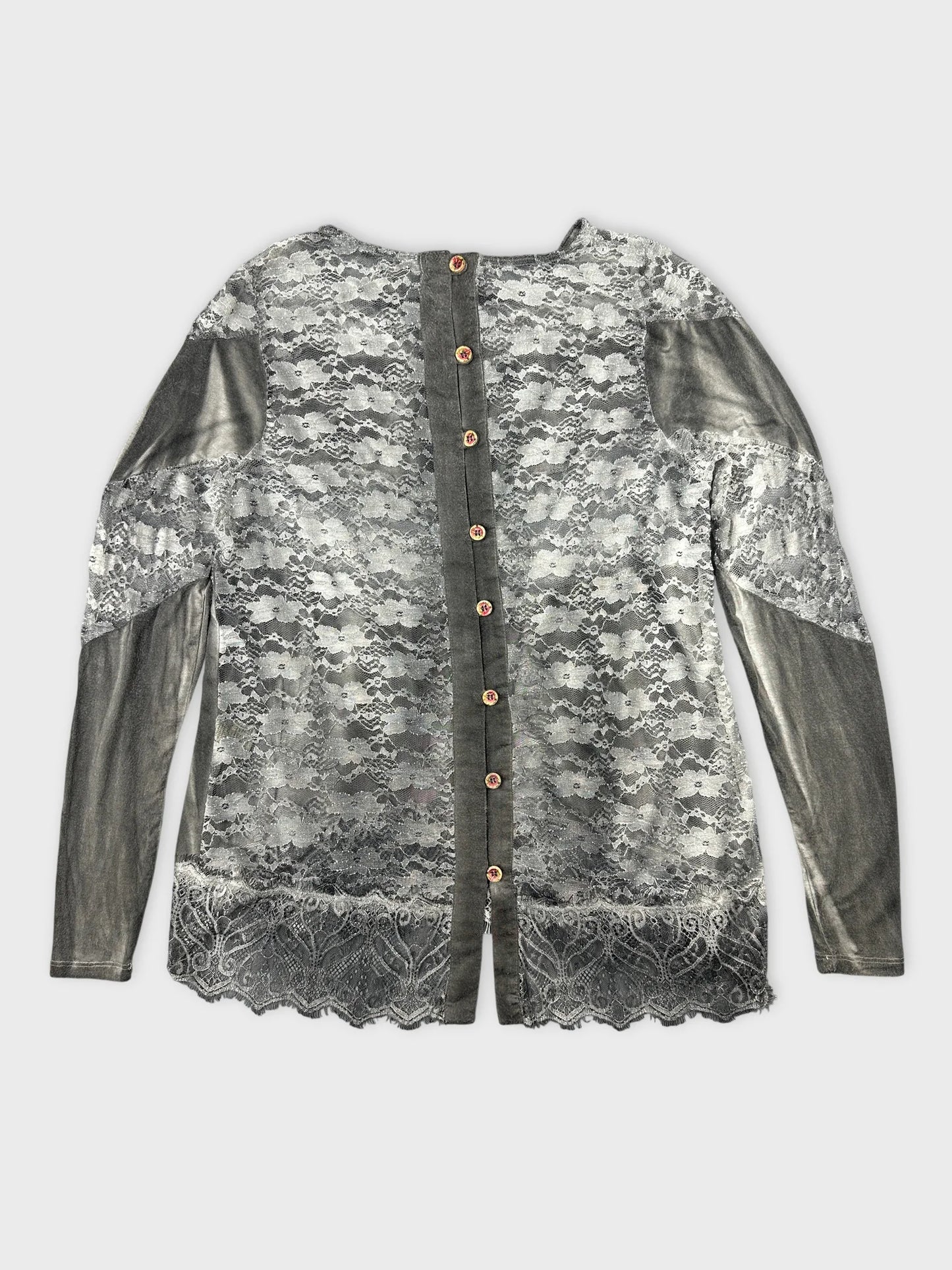 Detail view of a grey vintage body shirt with lace trim and buttons.