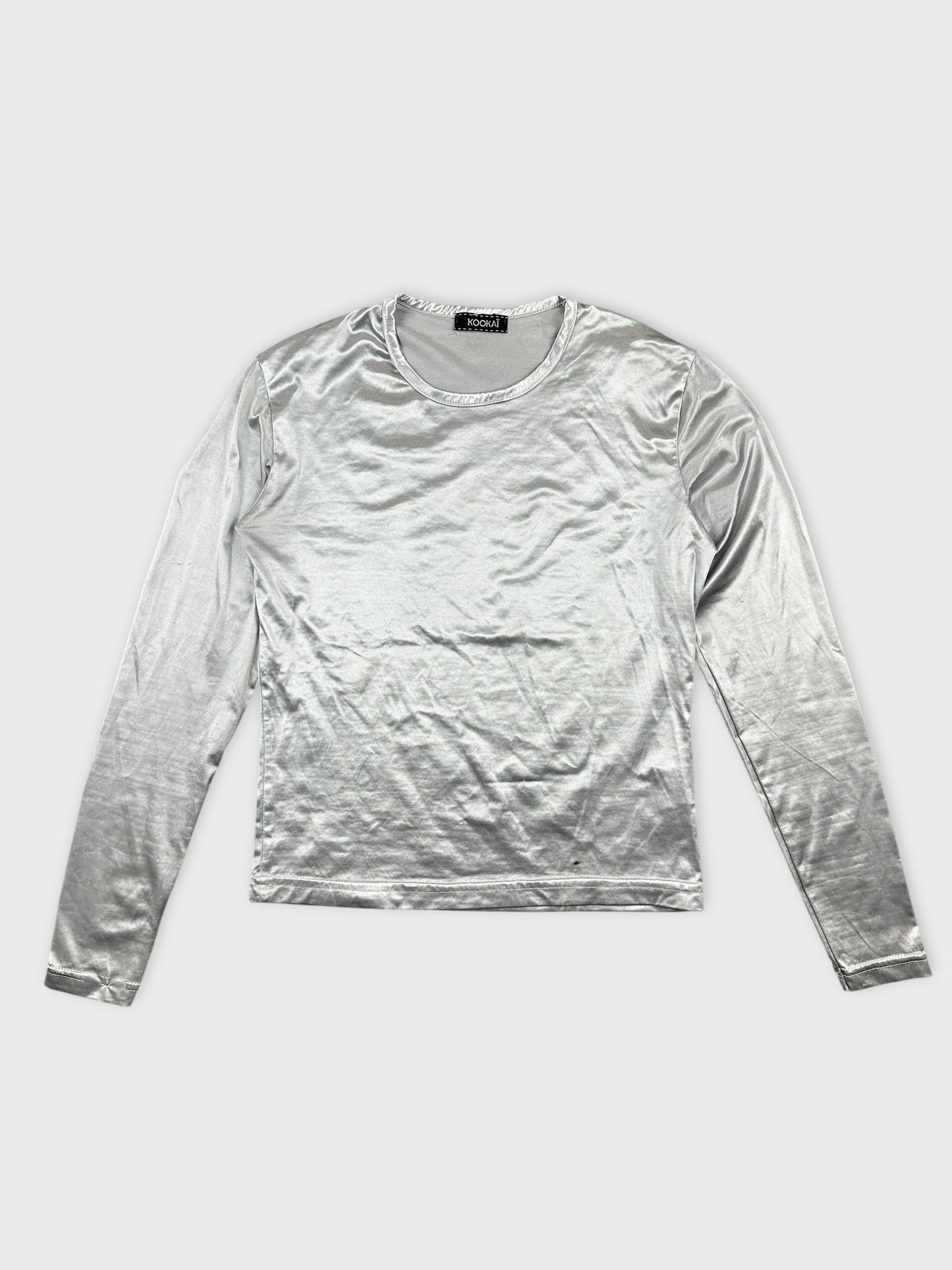 Front view of a silver long-sleeve body shirt with a smooth texture.