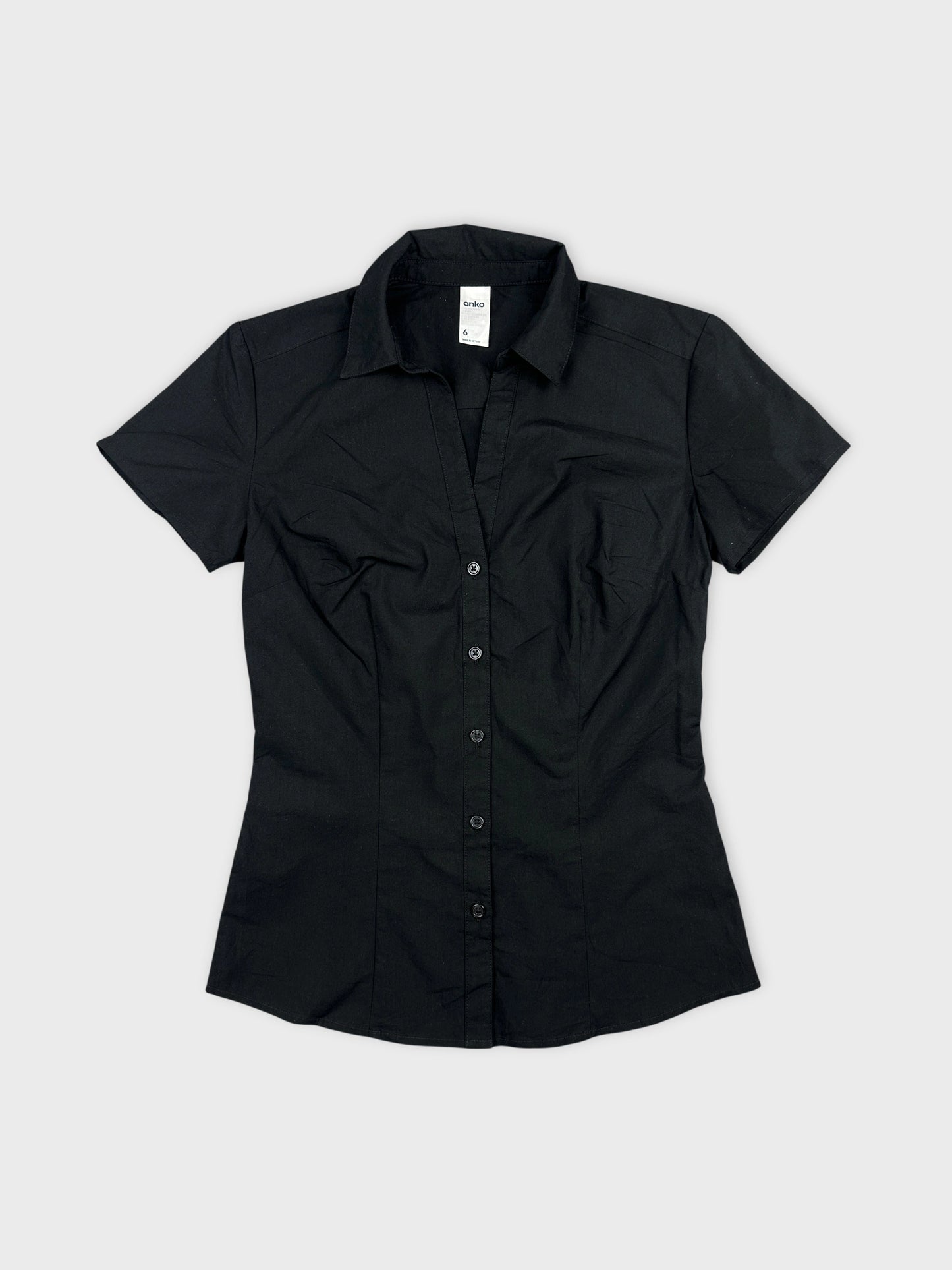 Black body shirt featuring a fitted design front view