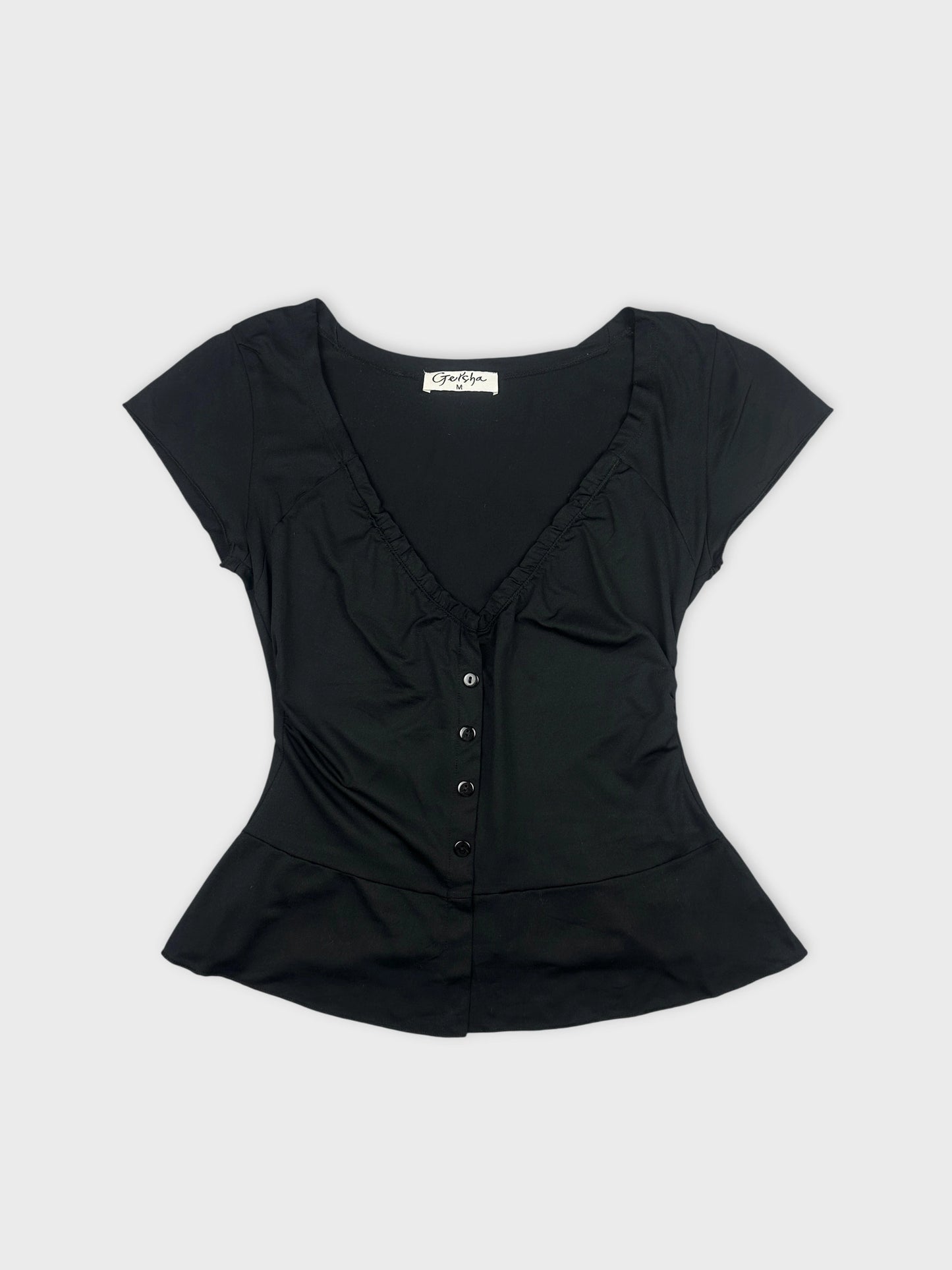 Black body shirt with ruffled neckline front view