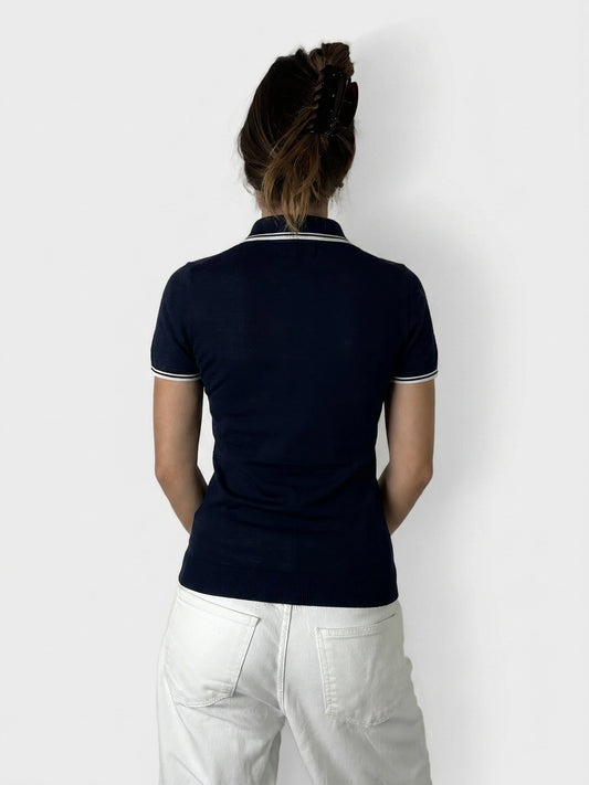 Back view of a navy blue women's body shirt with ribbed trim.