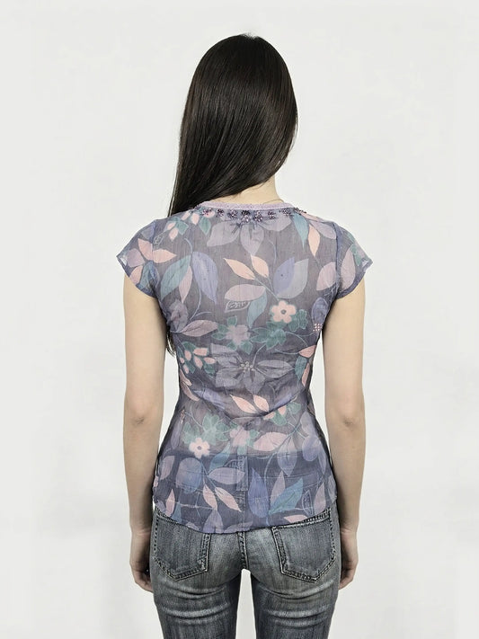 Back view of a purple floral body shirt with cap sleeves.
