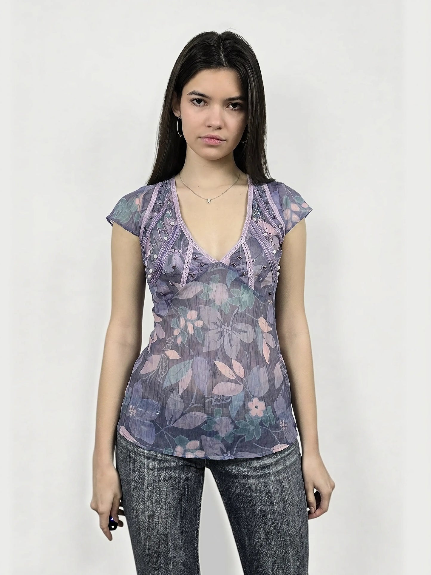 Purple floral body shirt with lace trim, shown in front view.