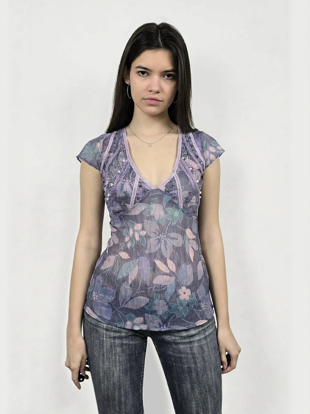Purple floral body shirt with lace trim, shown in front view.