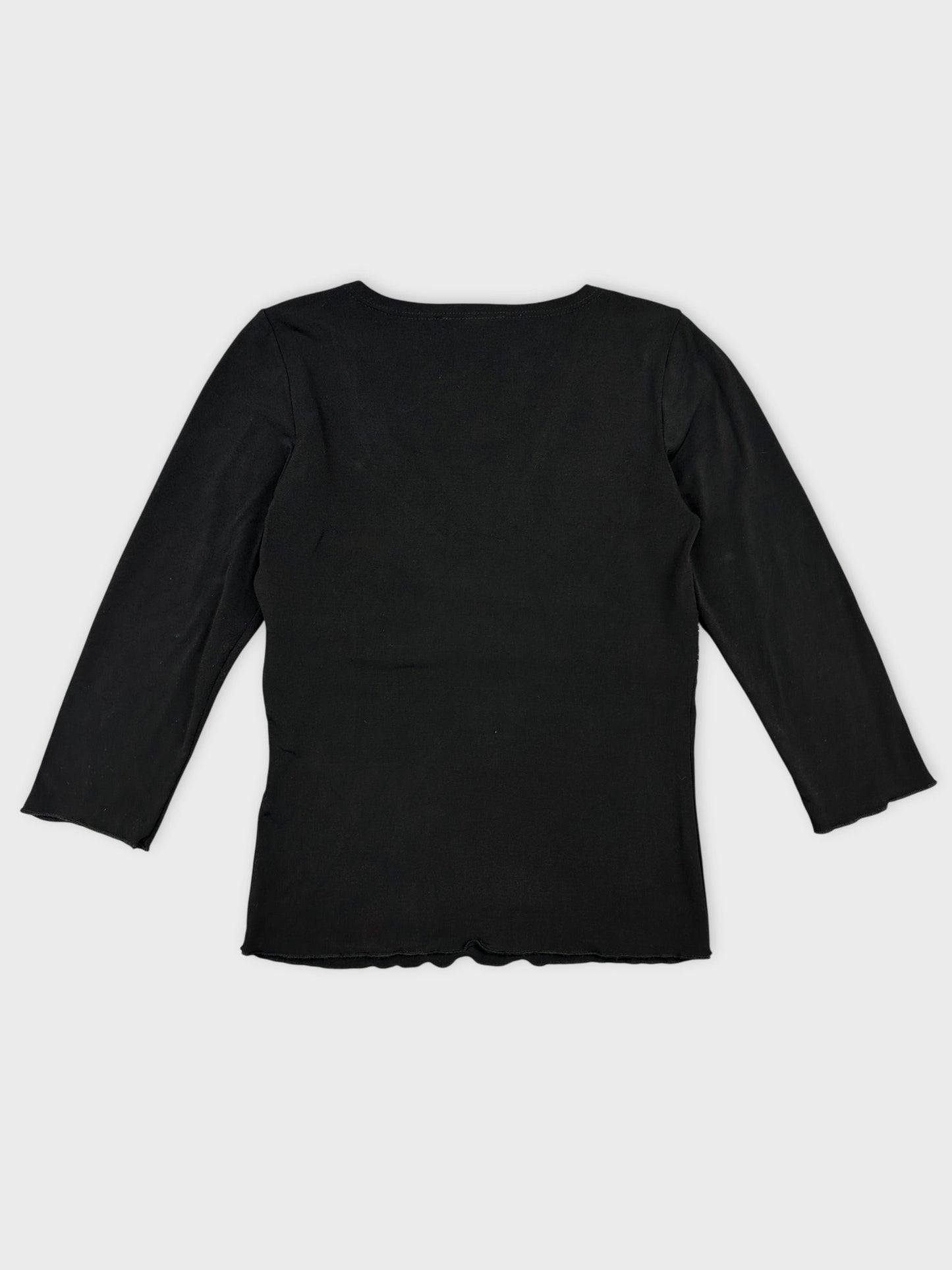 Back view of a black women body t-shirt with scalloped hem.