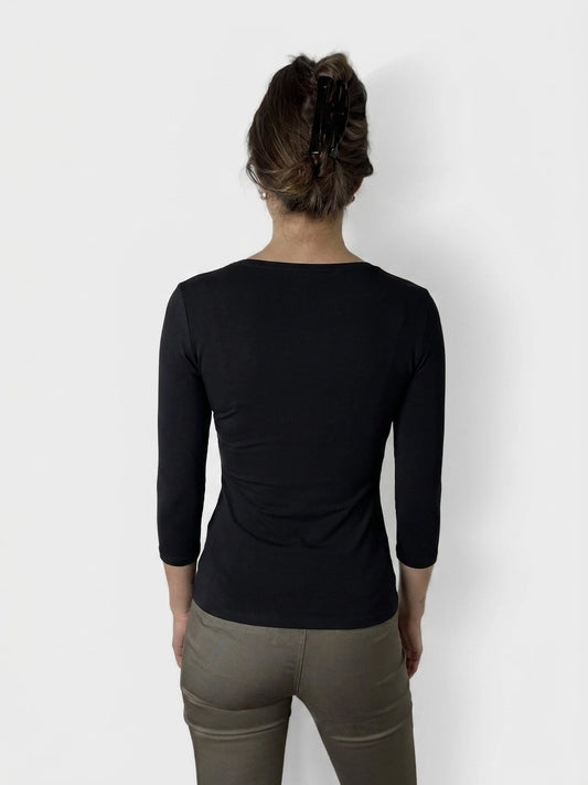 Back view of a black women's body t-shirt with long sleeves.
