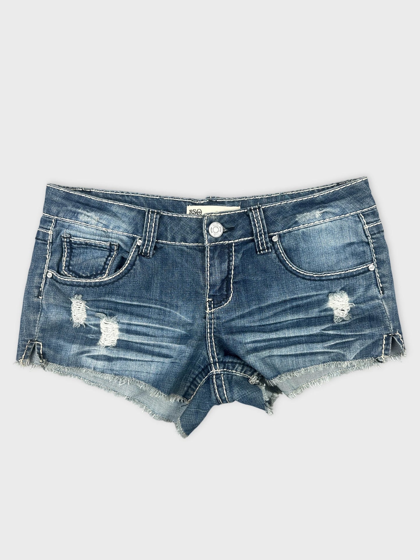 Front view of blue denim shorts featuring distressed details and frayed hem.
