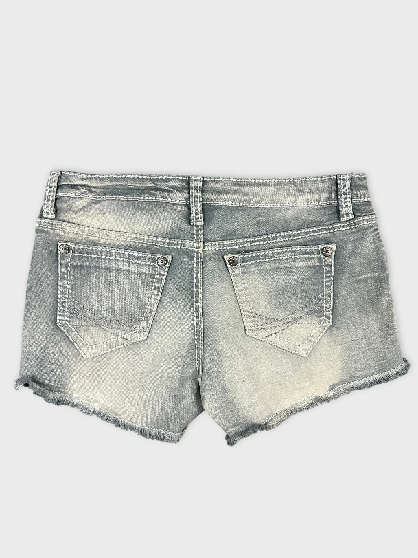 Back view of faded blue denim shorts with stitched pockets.