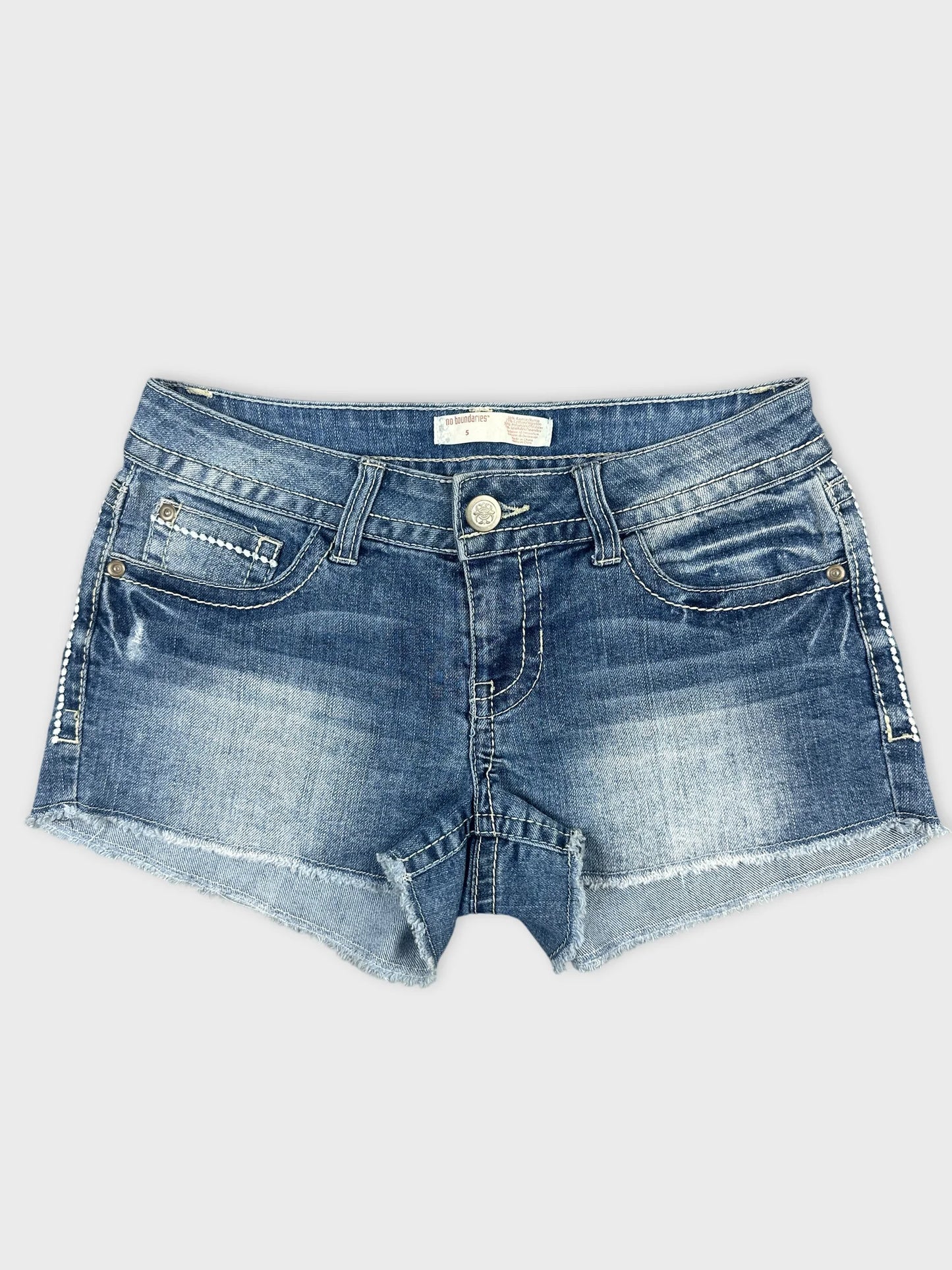 Front view of blue denim shorts with frayed hem and pockets.