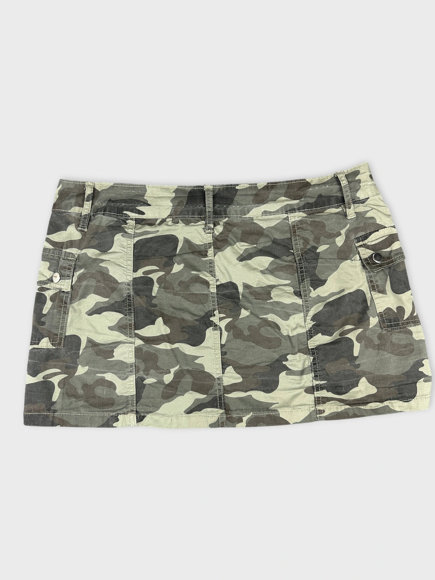 Back view of camouflage skirt featuring pockets and a fitted shape.