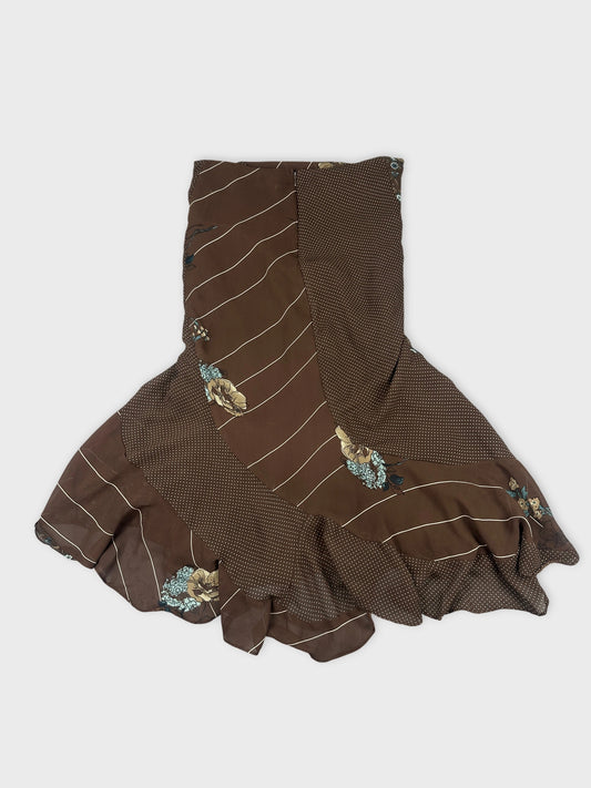 Back view of a brown ruffled skirt with floral print and stripes