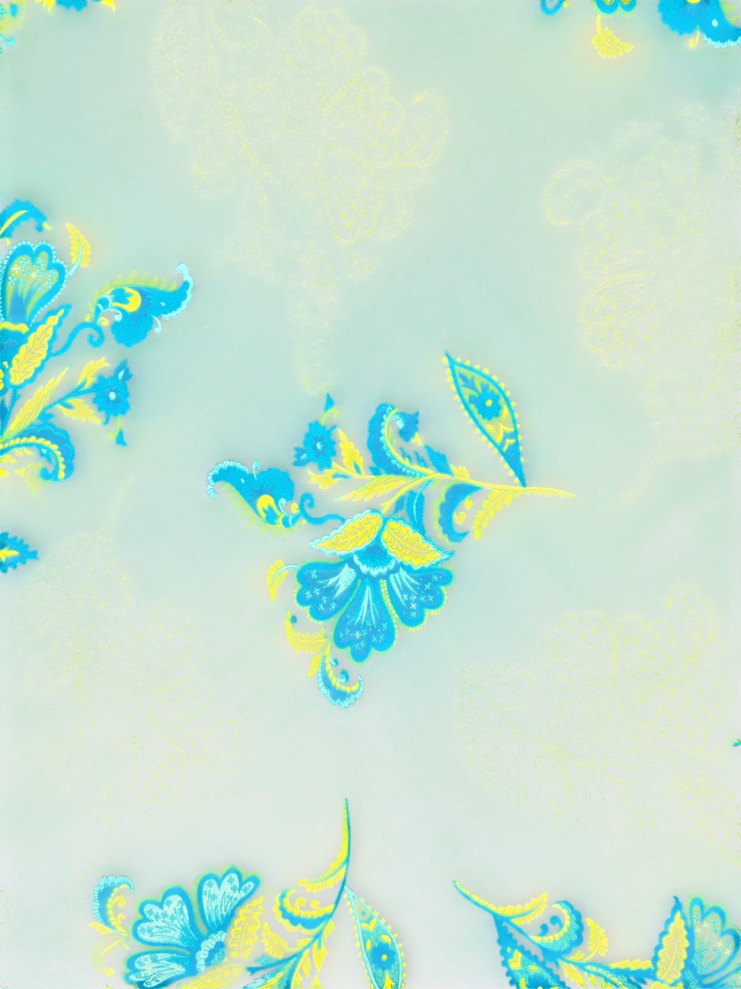 Detail view of a blue and yellow floral printed skirt.