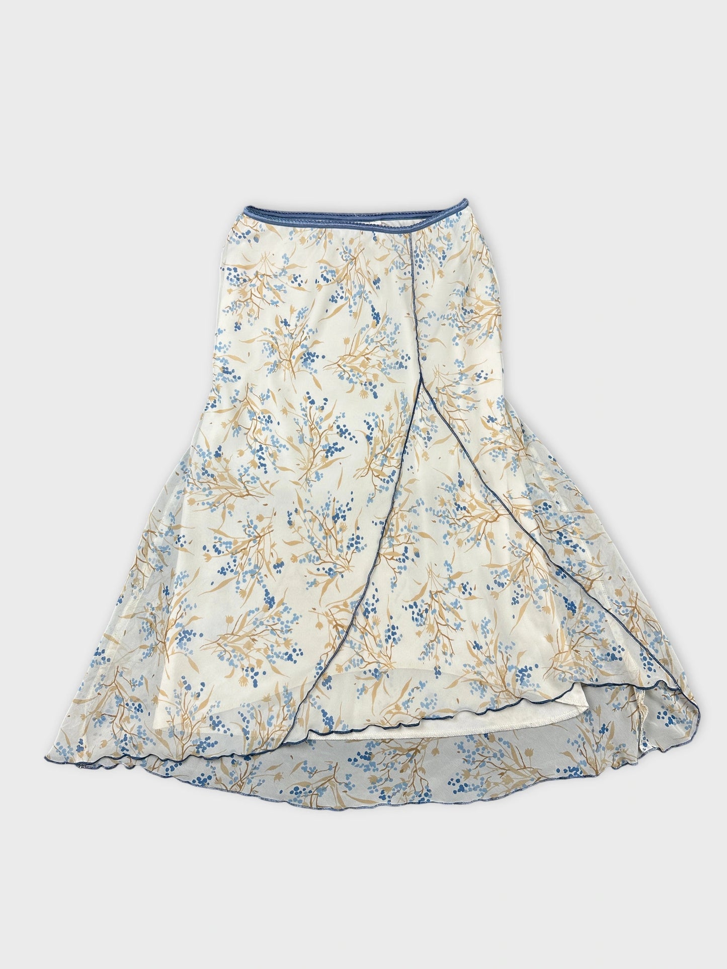 Front view of a floral print skirt in cream and blue colors.