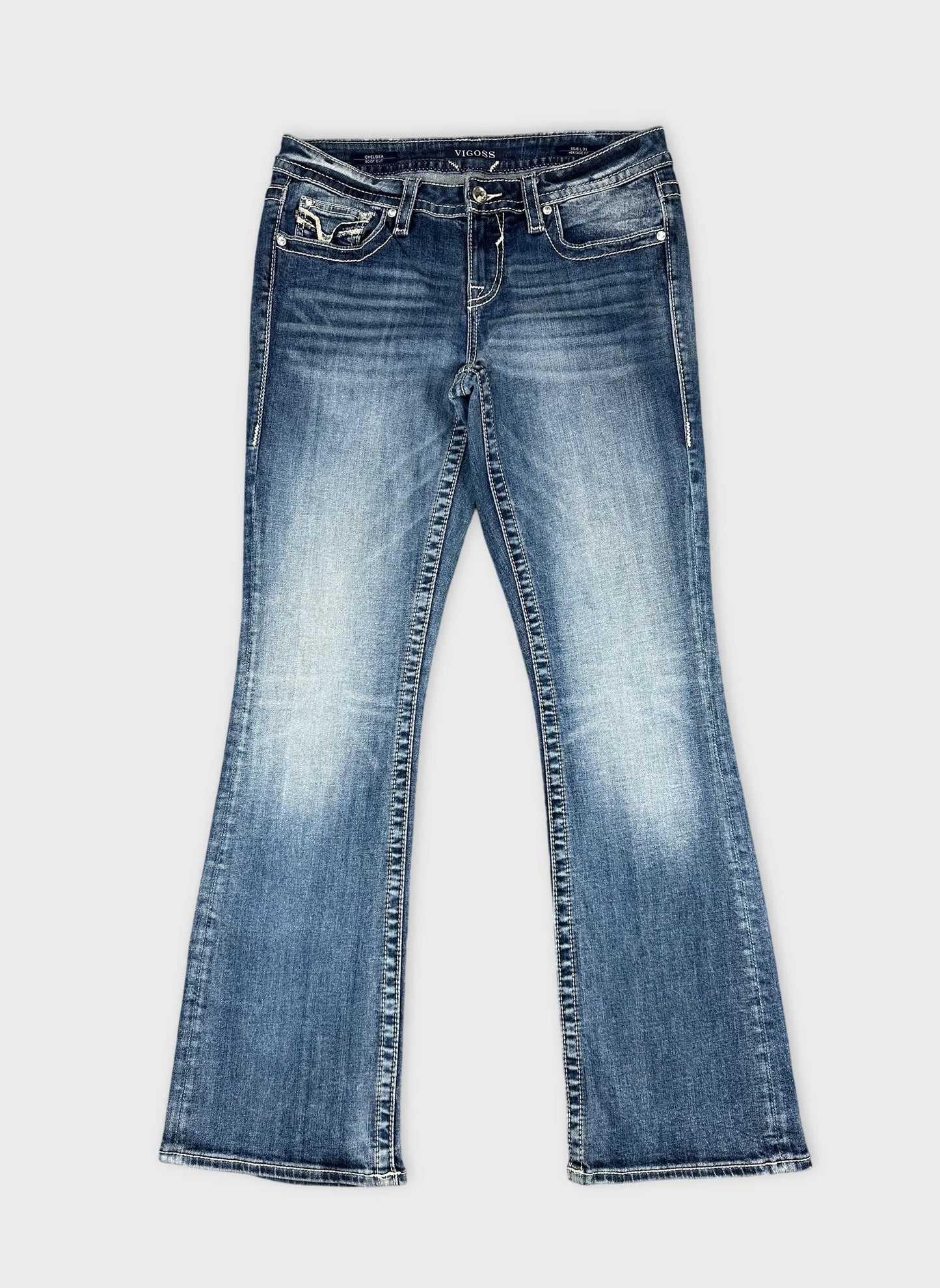 Front view of women's denim jeans in blue with flared legs.
