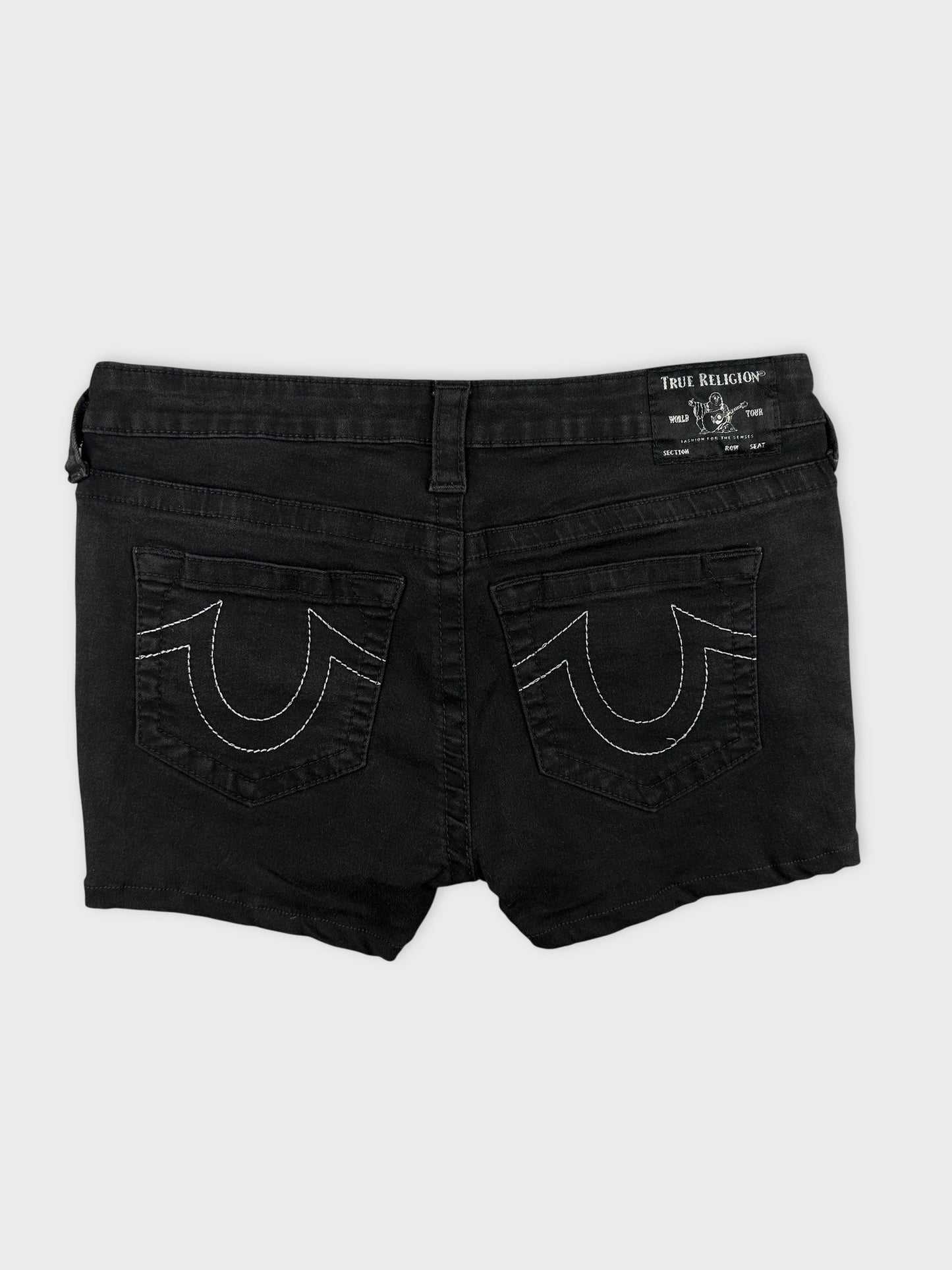Back view of women denim shorts in black featuring decorative stitching on pockets.