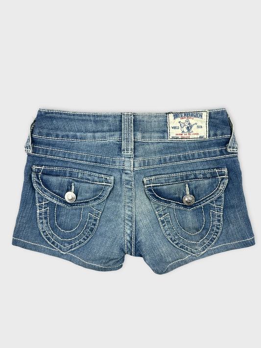 Back view of women denim shorts in light blue with decorative pockets.