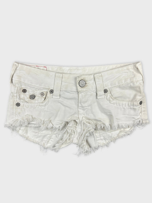 Front view of white denim shorts featuring frayed hems and two front pockets.