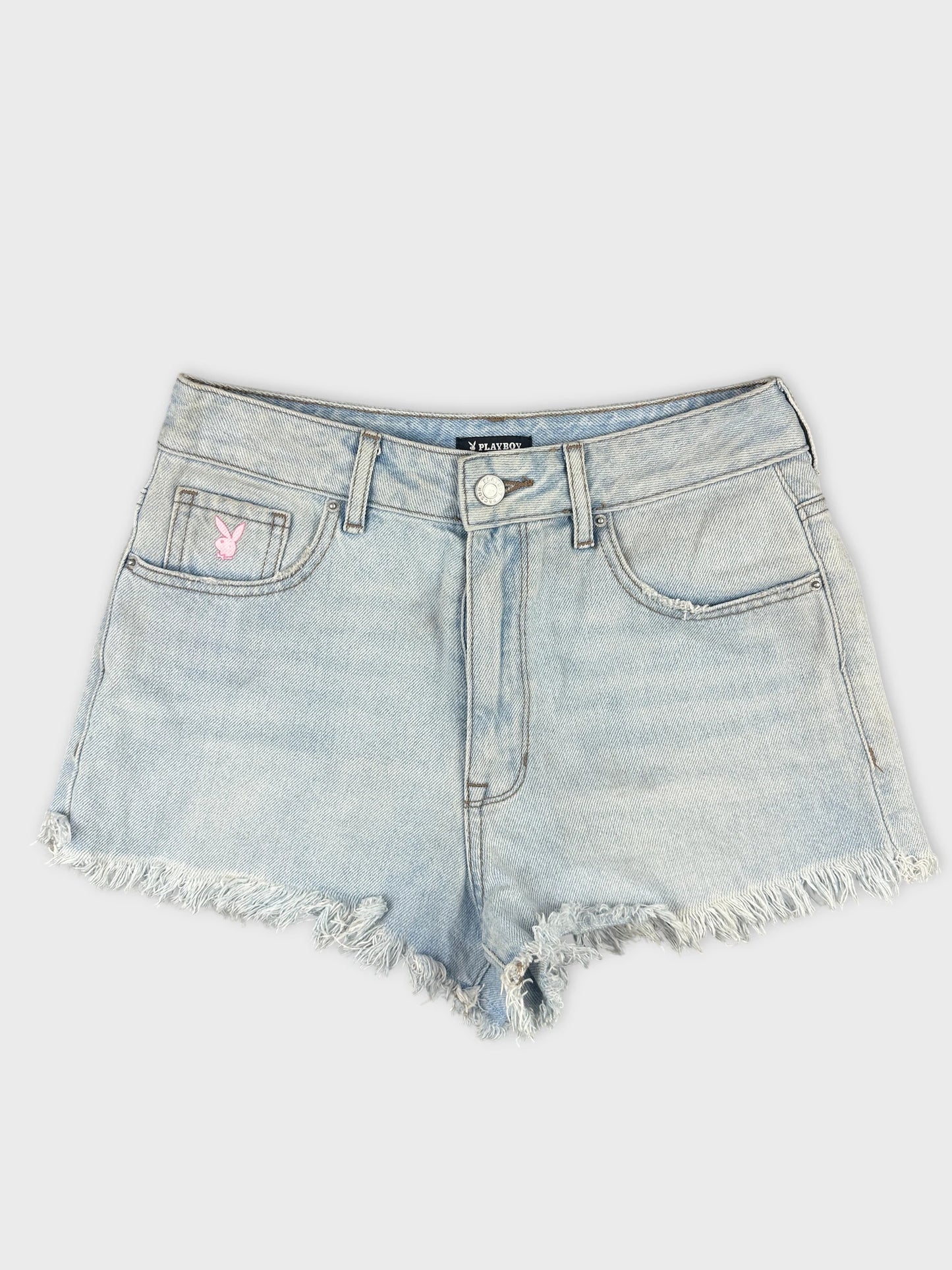 Front view of women denim shorts in light blue with a frayed hem.