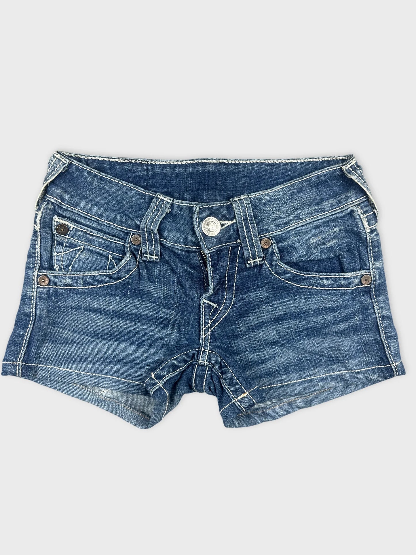 Front view of women denim shorts in blue featuring visible pocket details.
