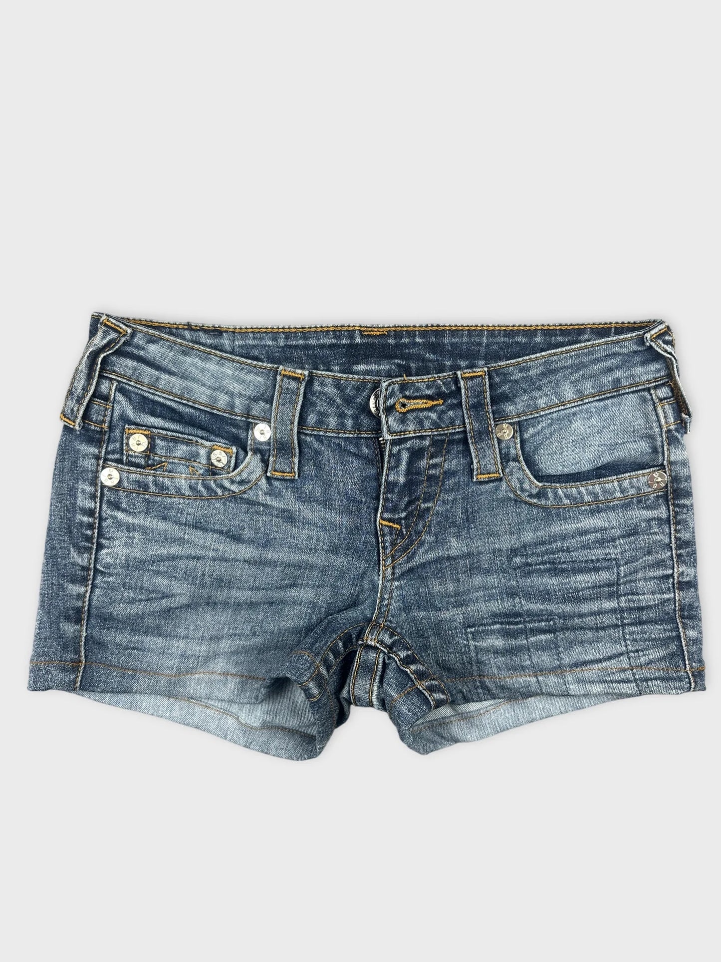 Front view of women denim shorts in faded blue with visible front pockets.