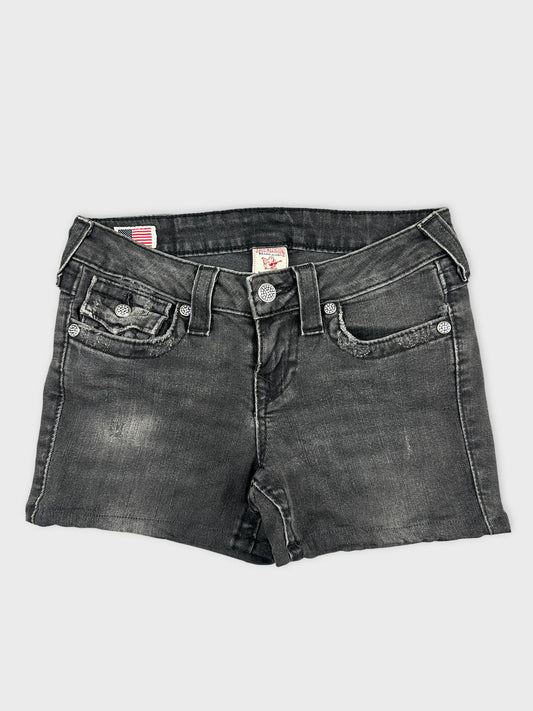 Front view of women's denim shorts in black with distressed detailing.
