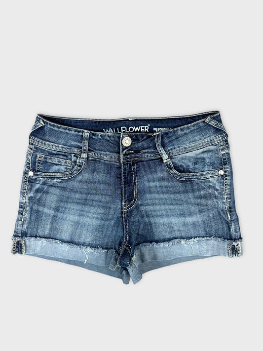 Denim shorts in dark blue with frayed hem front view