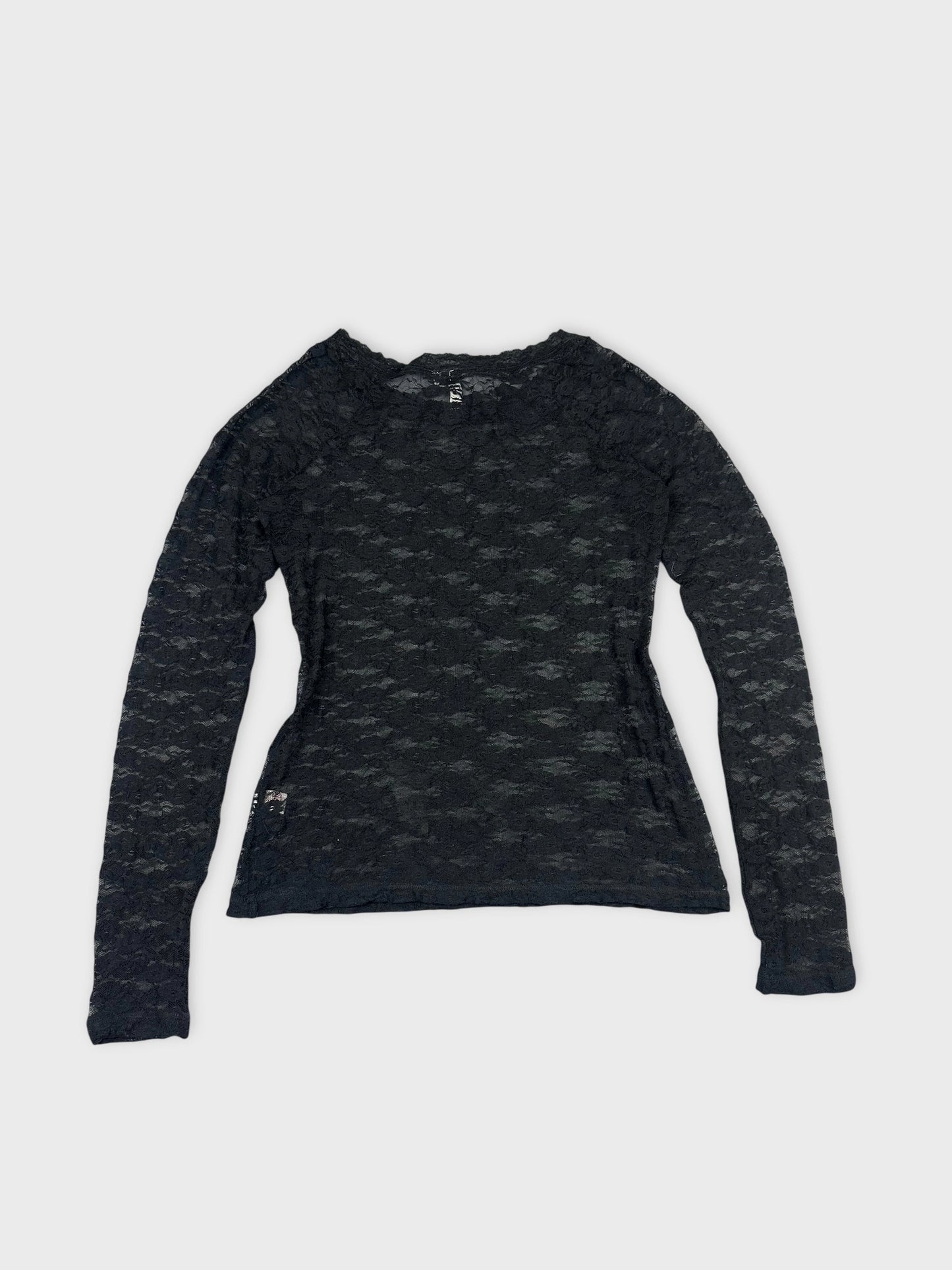 Back view of a black long sleeve blouse with textured lace detailing.