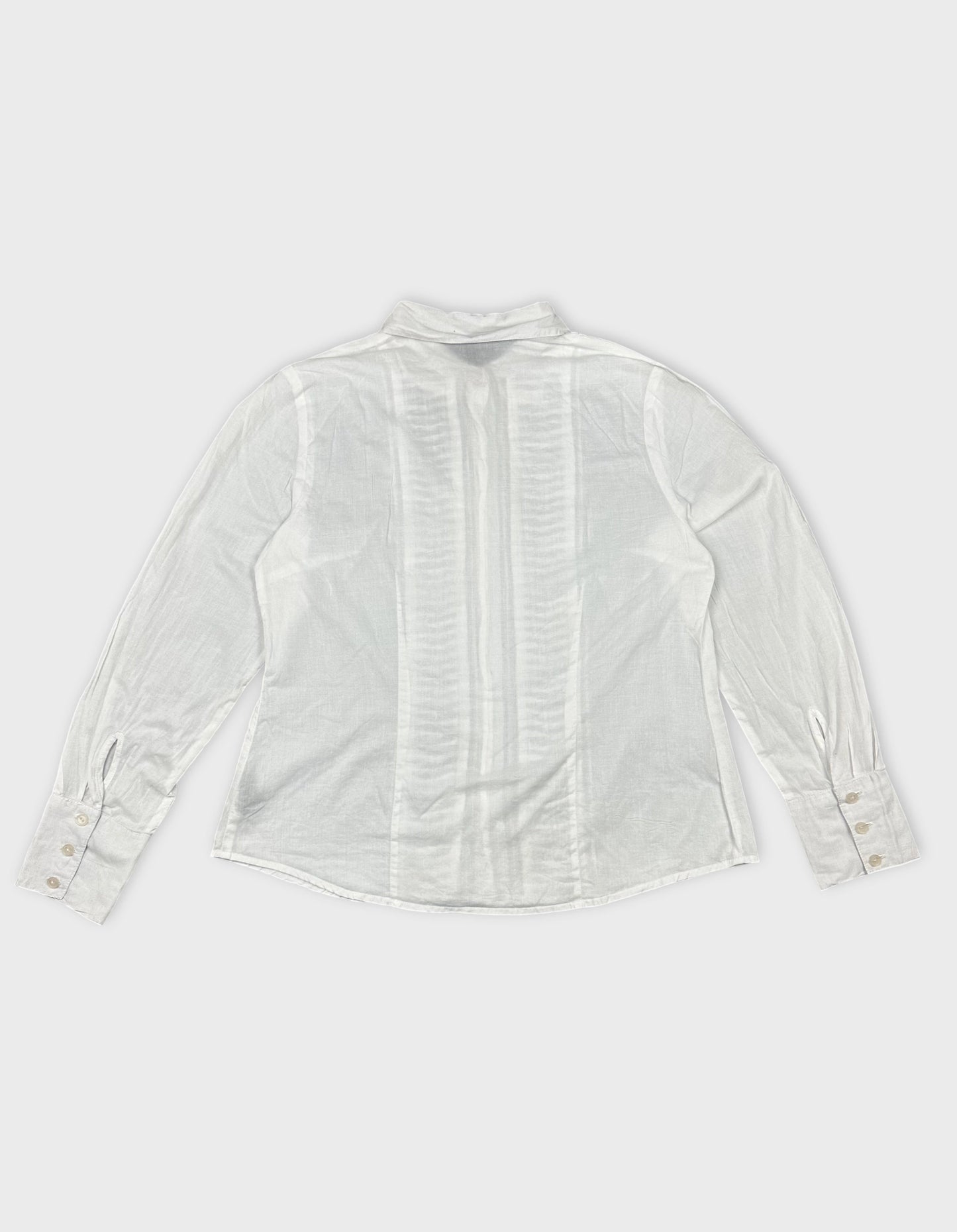 Back view of a white long sleeve button up shirt with pleated design