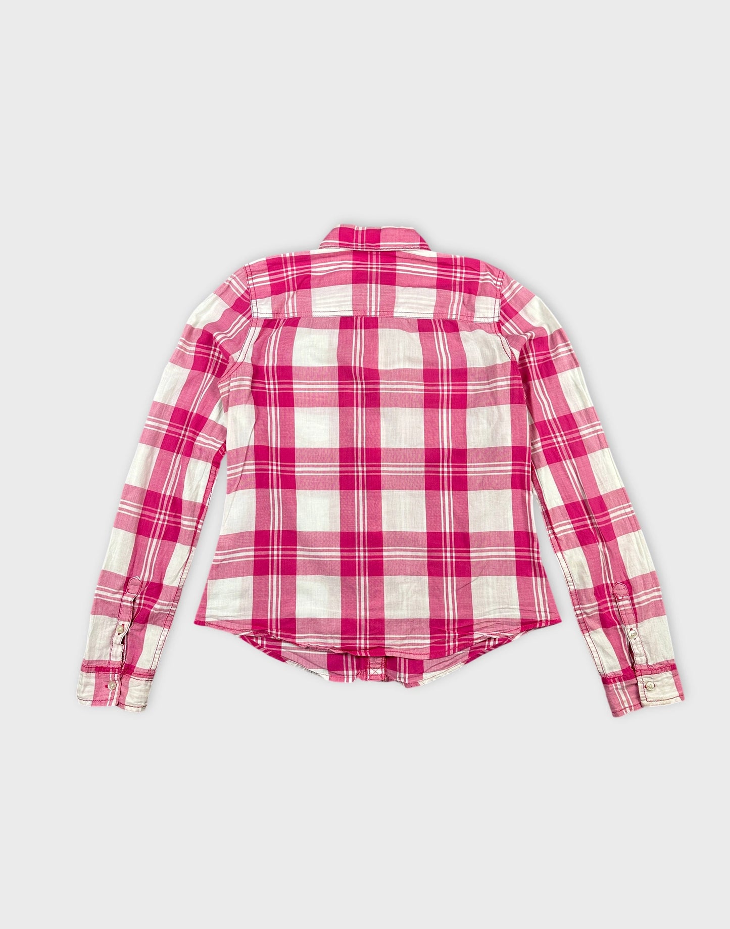 Back view of a long sleeve shirt in pink plaid pattern.