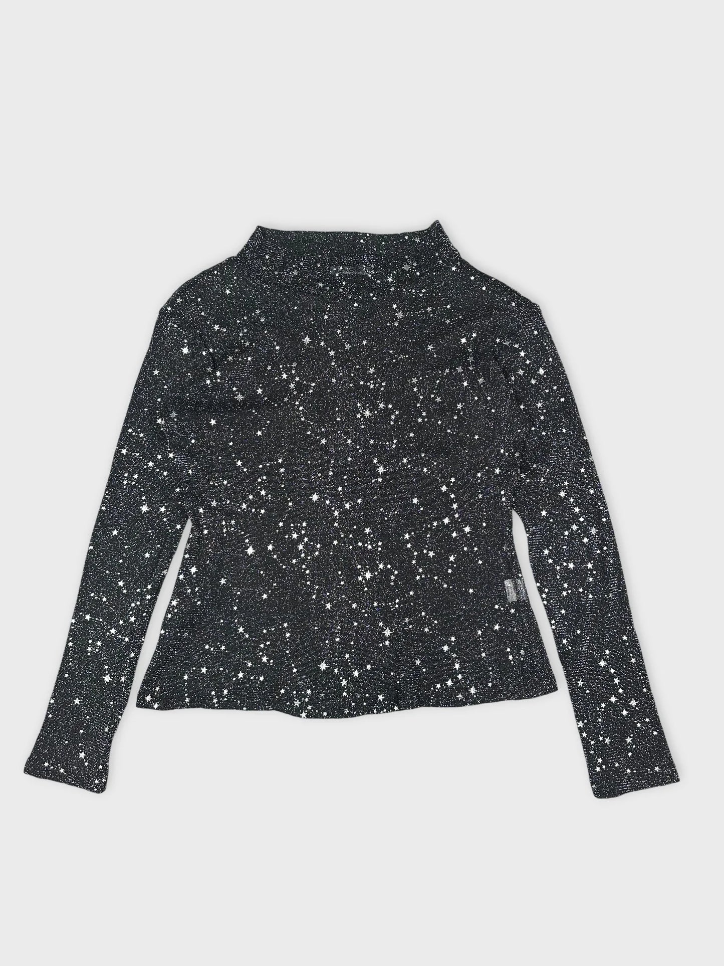 Front view of black long sleeve shirt with star pattern.