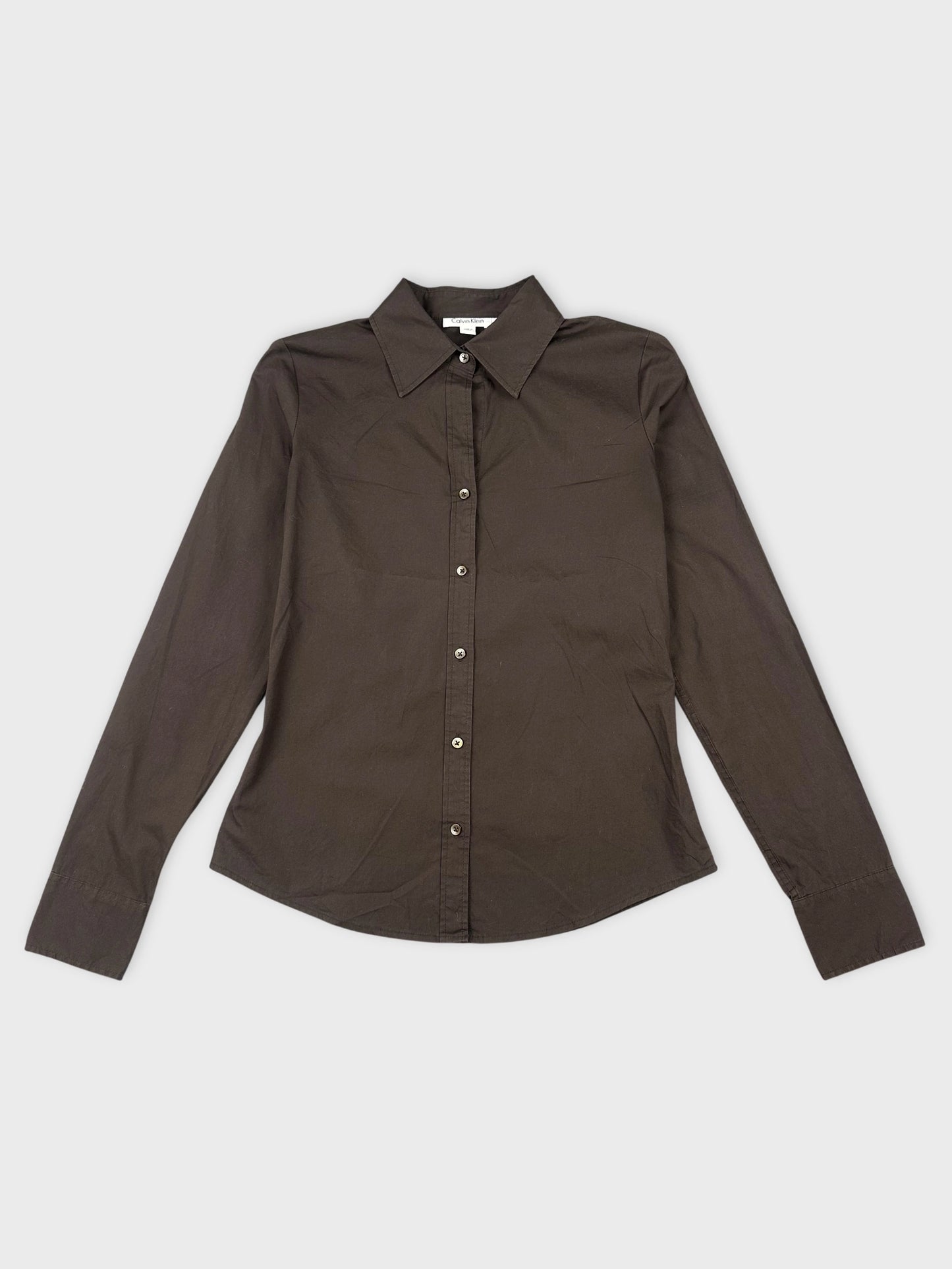 Front view of a dark brown long sleeve shirt with a sharp collar.