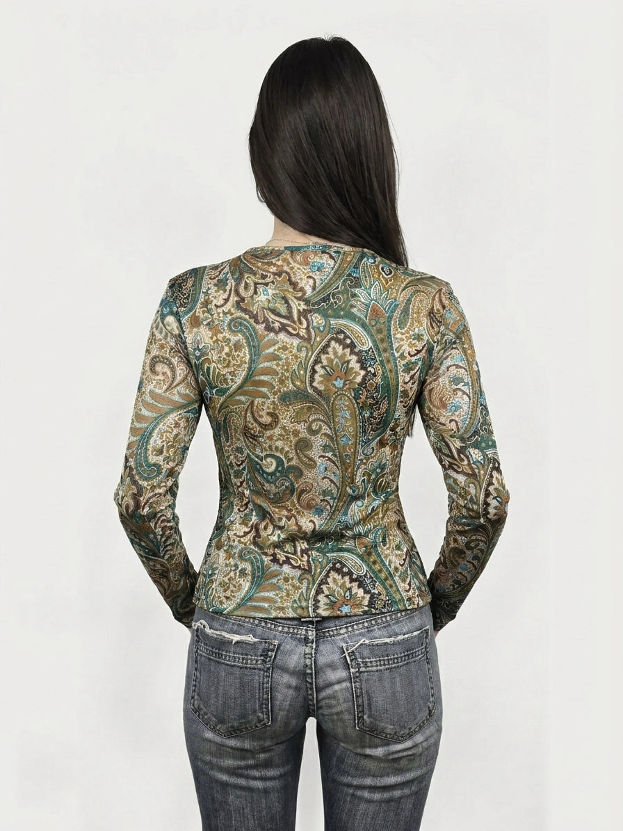 Women long sleeve shirt in green and brown paisley print, back view.