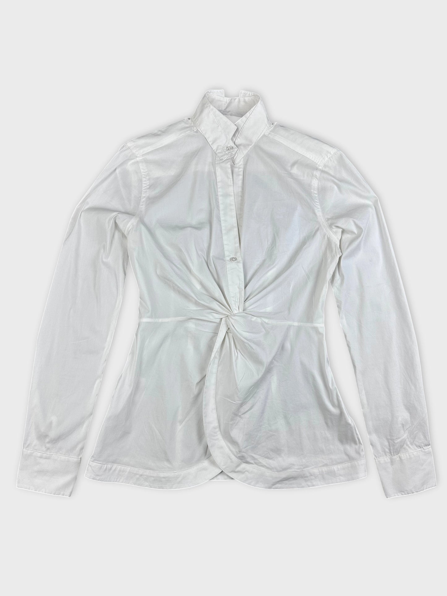 White long sleeve top with a knotted detail front view.