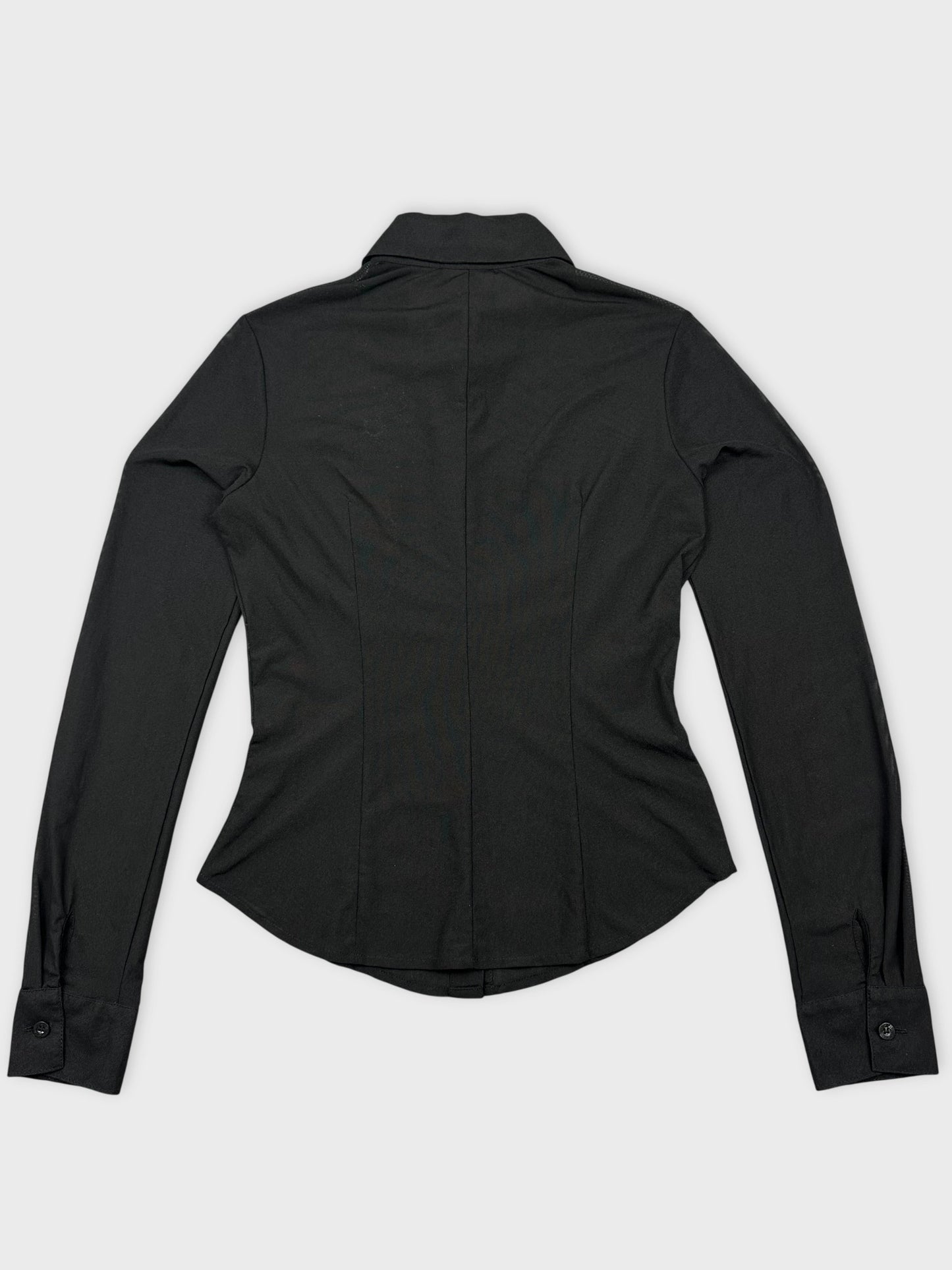 Back view of a black long sleeve top featuring a fitted design.
