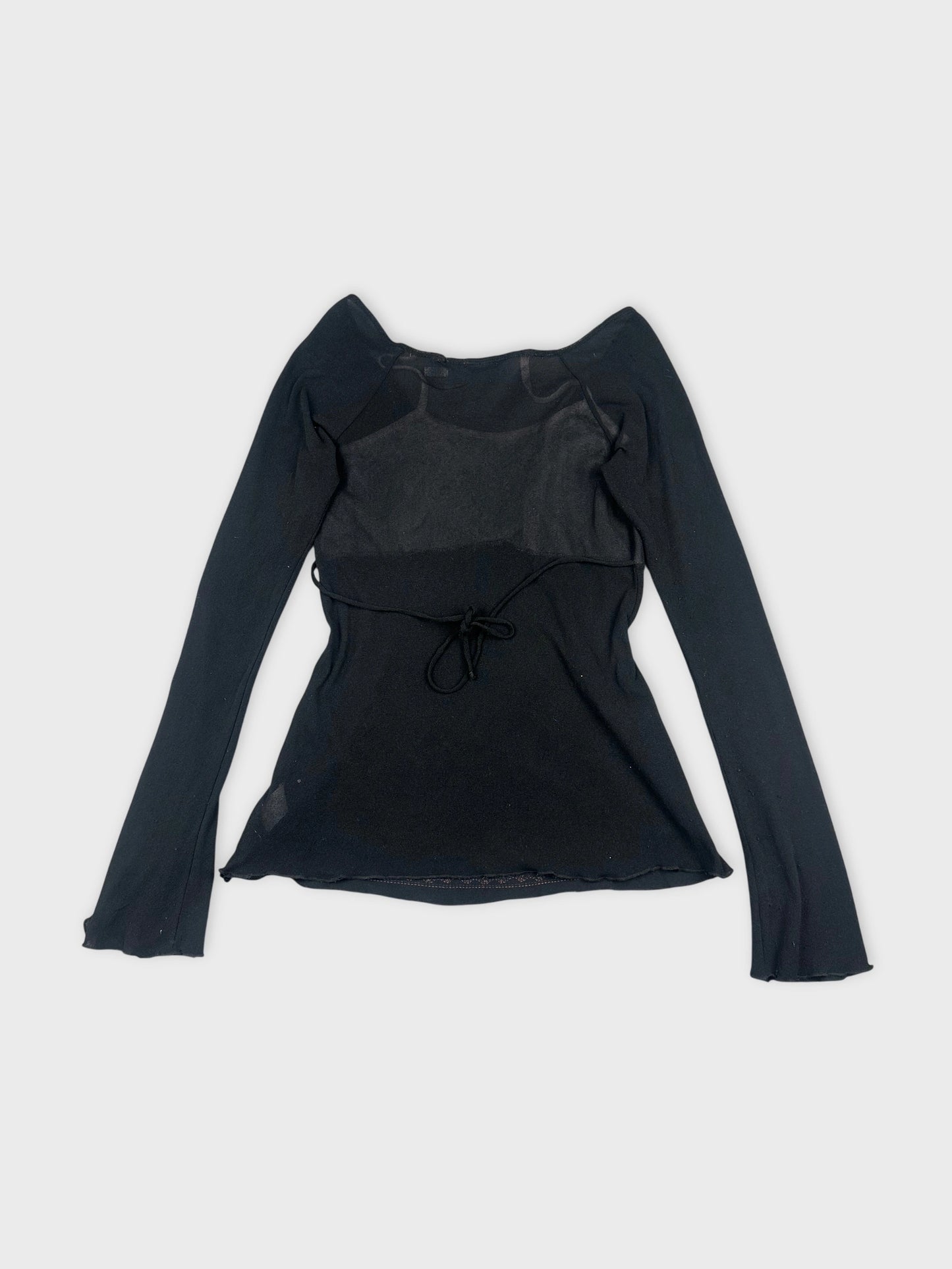 Back view of a black long sleeve top featuring a tie detail.