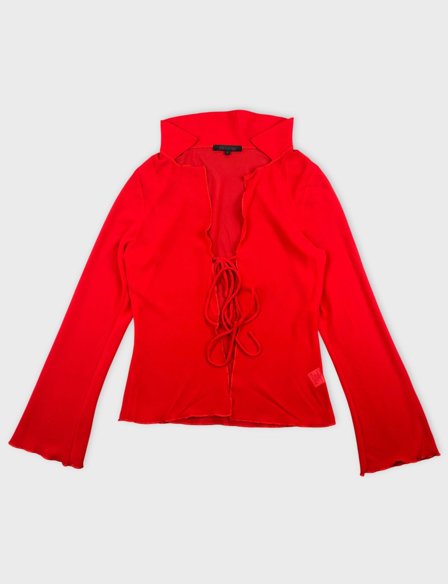 Red long sleeve top with lace-up detail front view