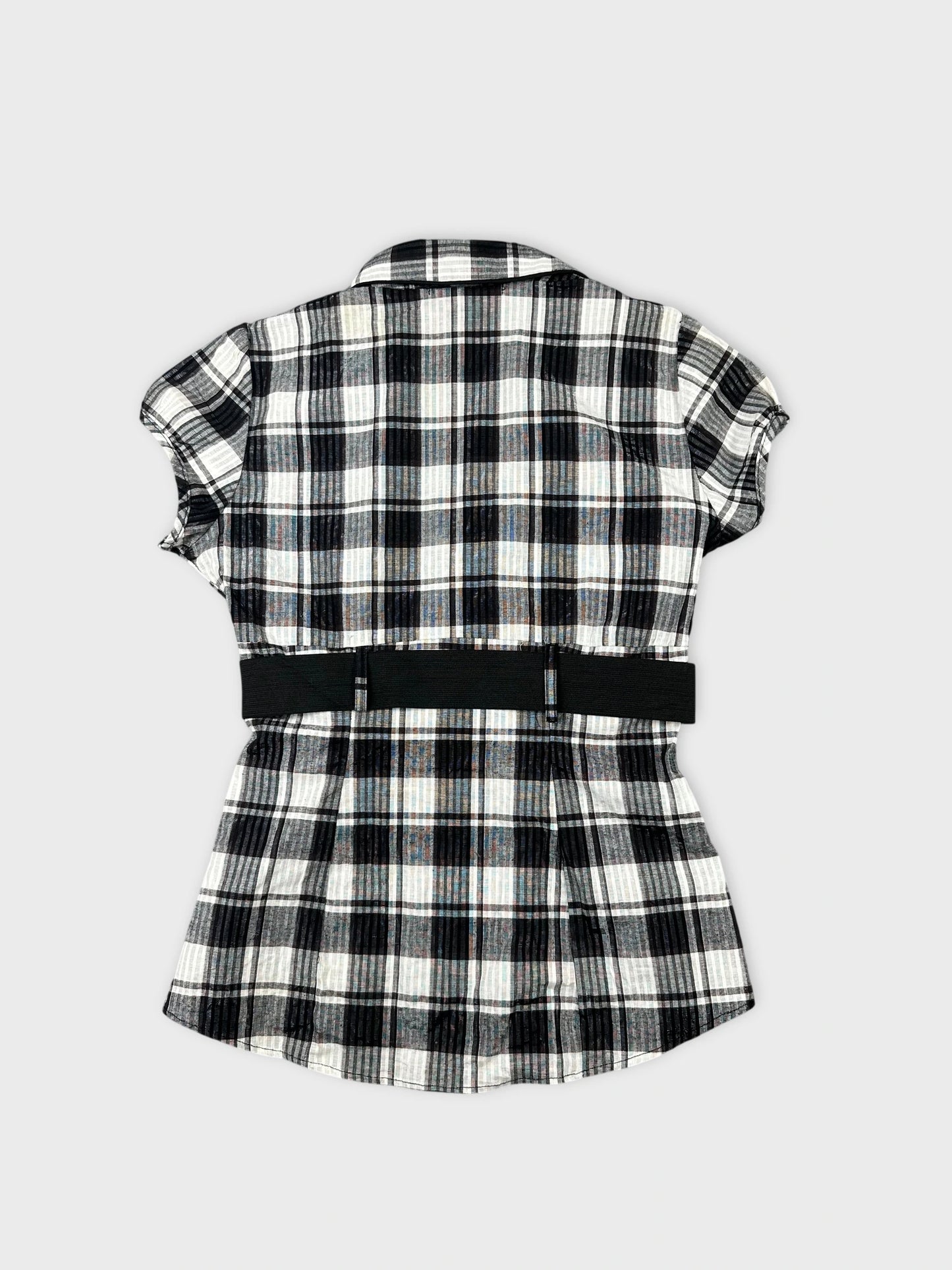 Back view of a black and white plaid short sleeve shirt with belt detail.