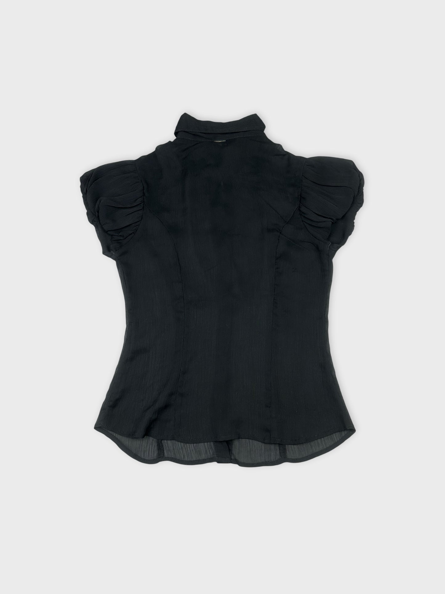 Back view of a black short sleeve shirt with puffed sleeves.