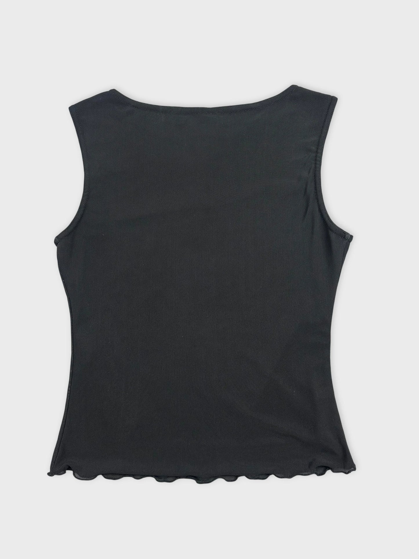 Back view of a black sleeveless top with scalloped hem.