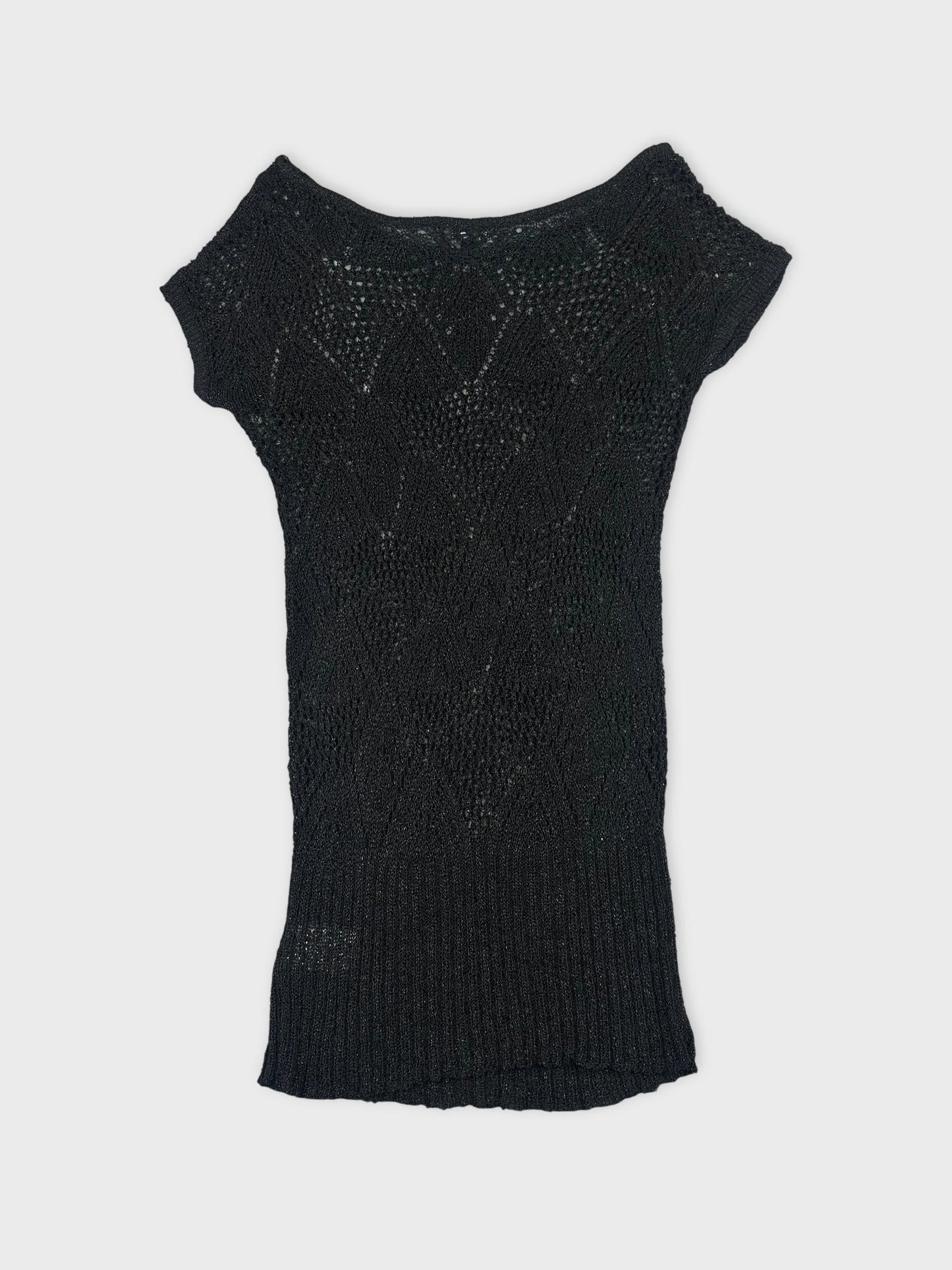 Back view of a black short sleeve top with a textured pattern.
