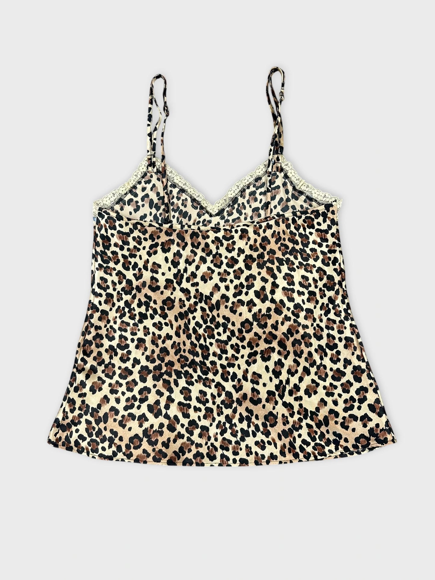 Back view of a leopard print camisole top with lace trim.