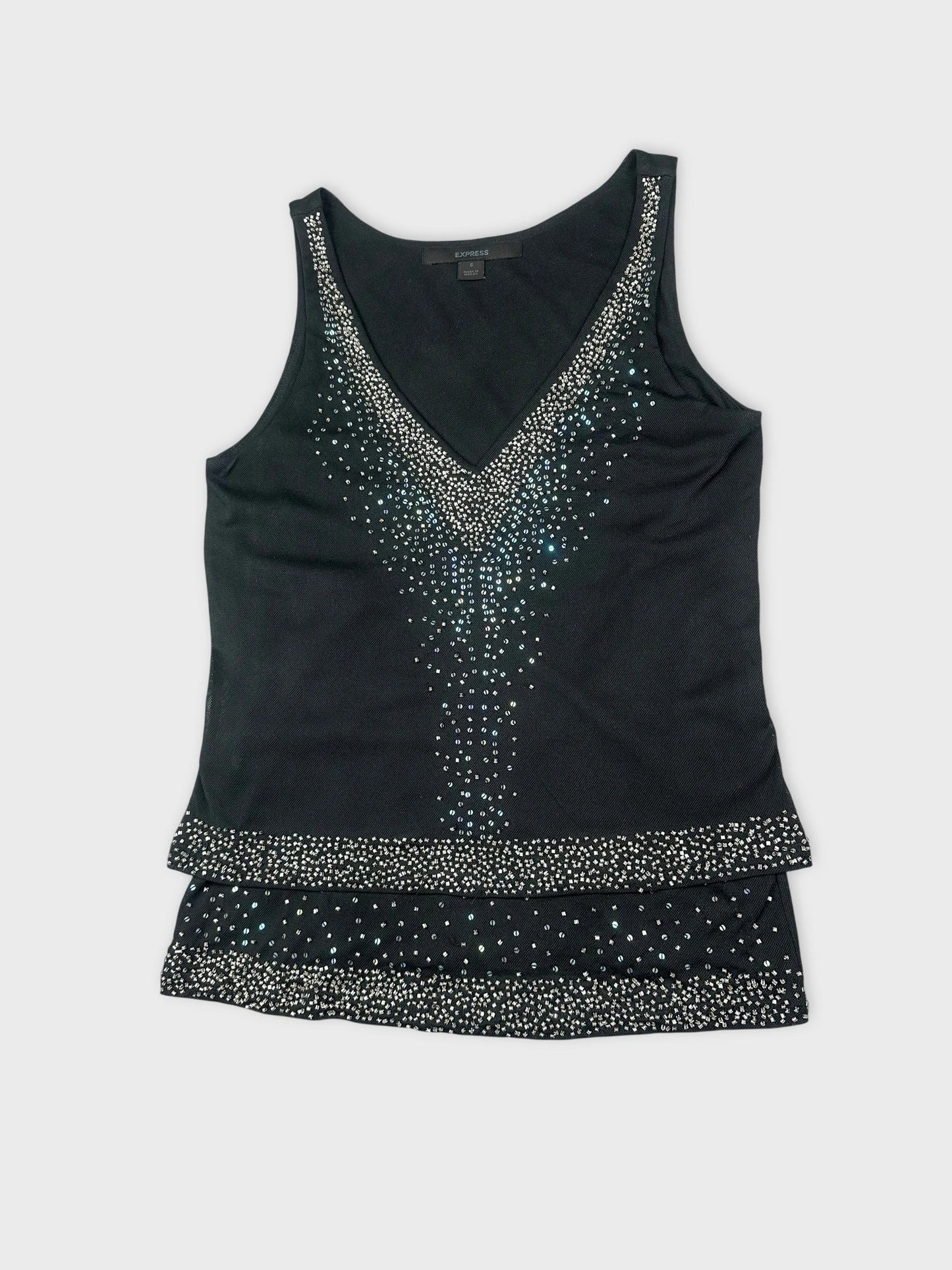 Black sleeveless top with sequins detail view.