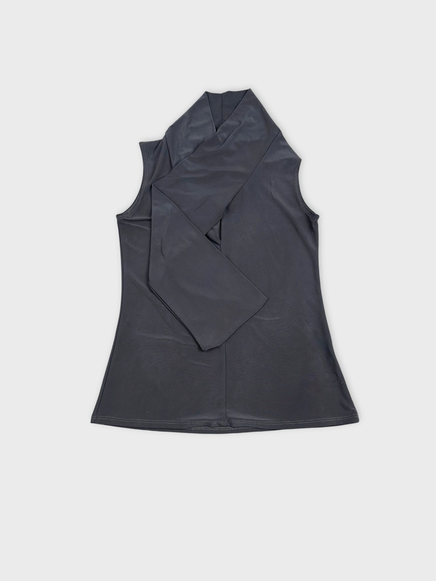 Black sleeveless top with wrap design front view
