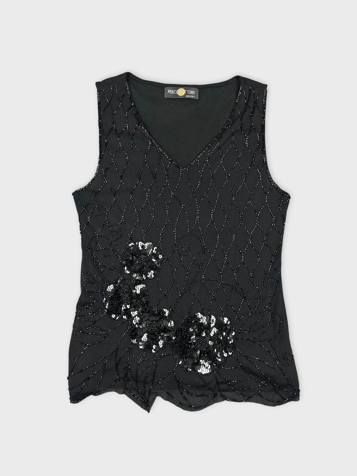 Black sleeveless top with floral sequined detail front view