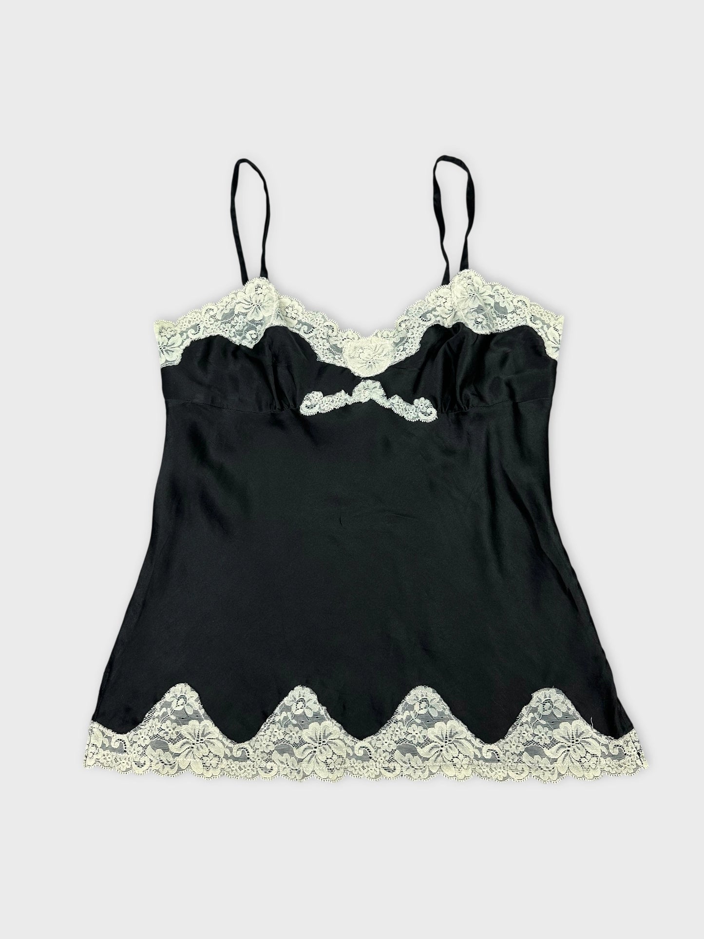 Black camisole with lace trim in front view.