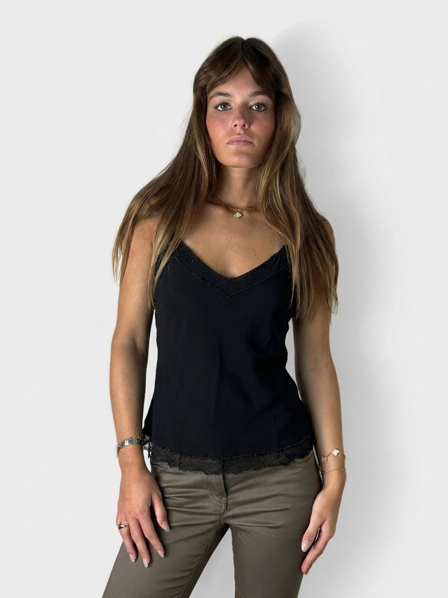 Black sleeveless top with lace trim, shown in front view.
