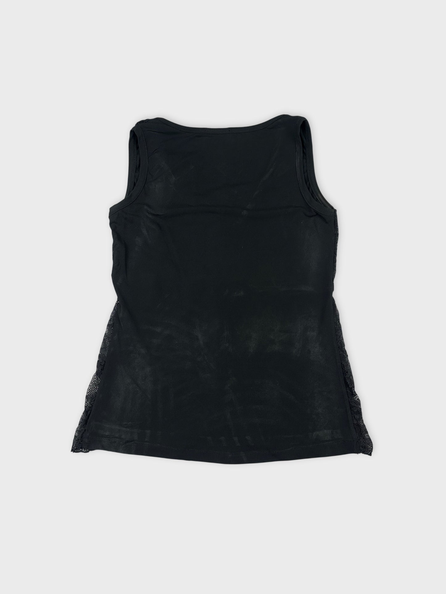 Black tank top with lace trim in back view.