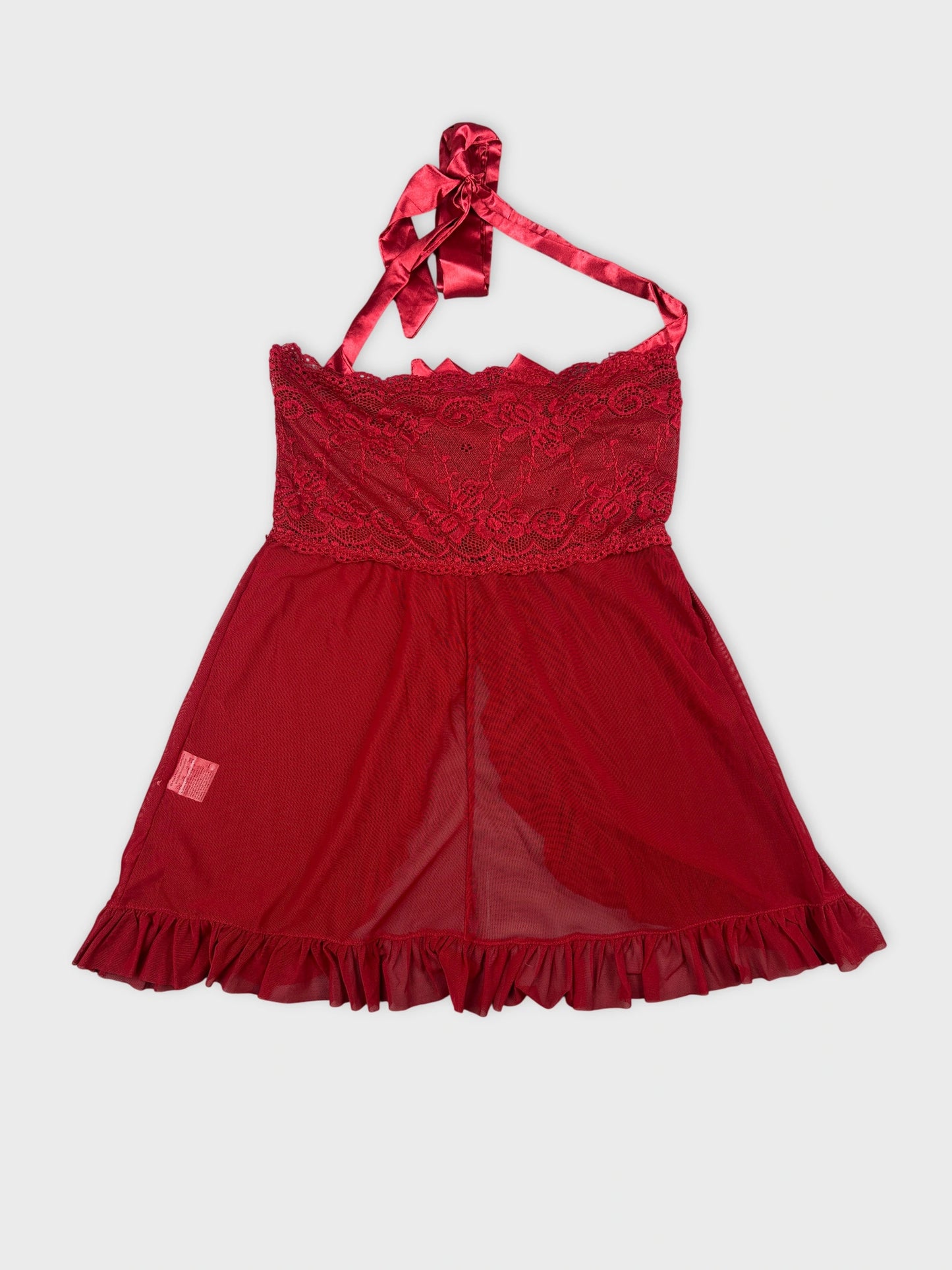 Back view of red vintage shorts with lace trim and halter ties.