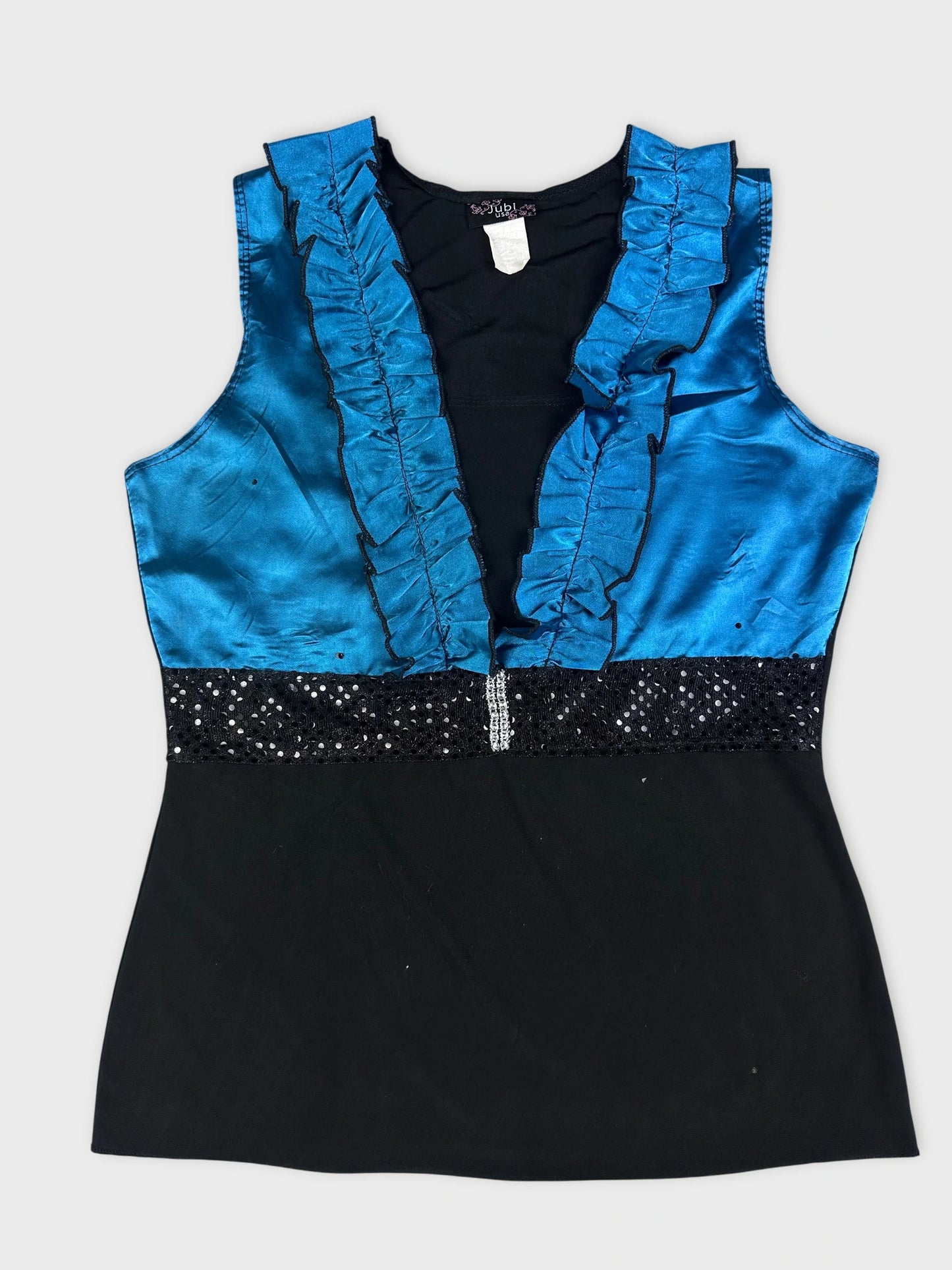 Front view of a women's top in blue with ruffled trim and sequined waistband.