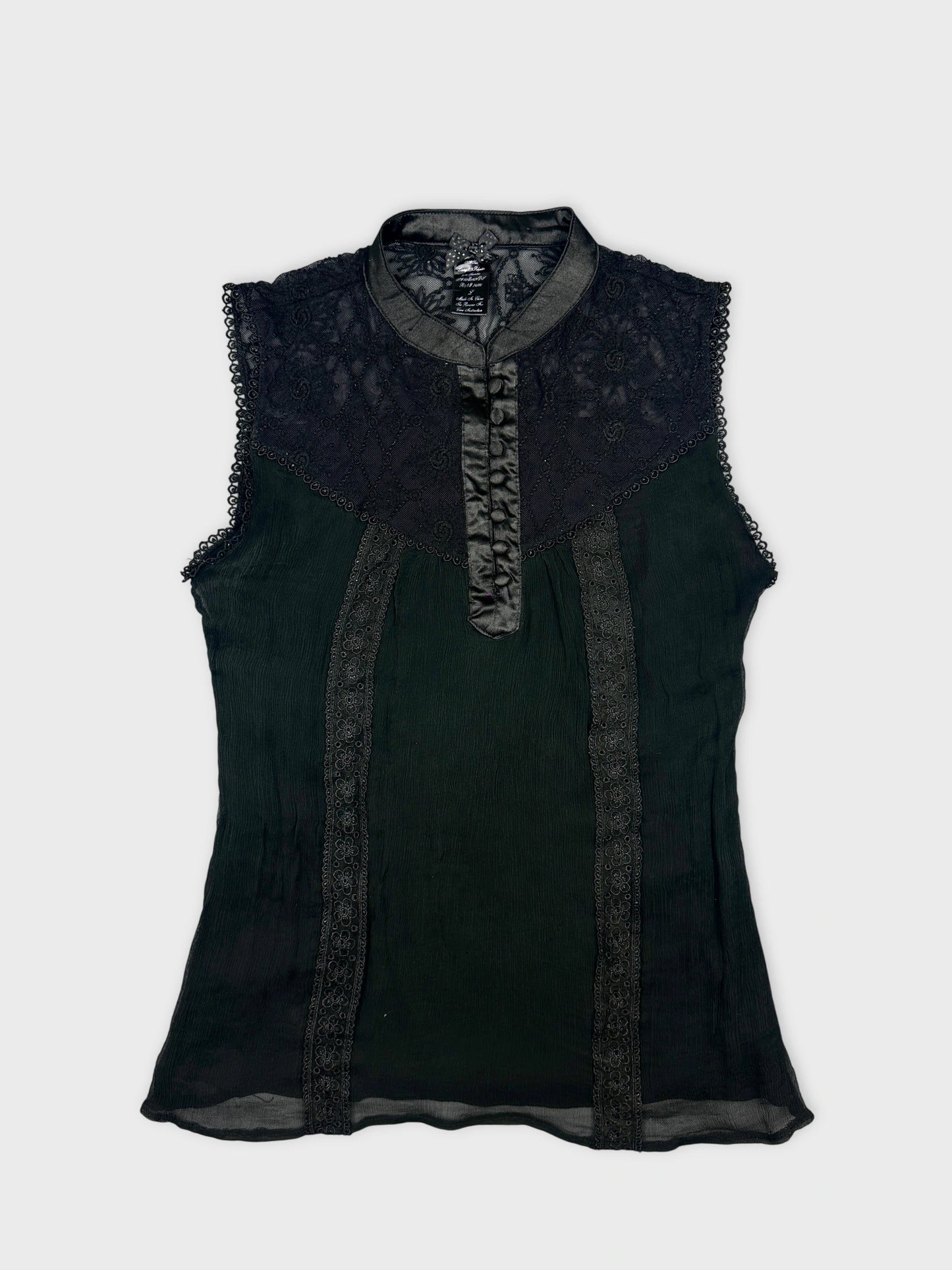 Front view of a black vintage upper body shirt with lace detailing.